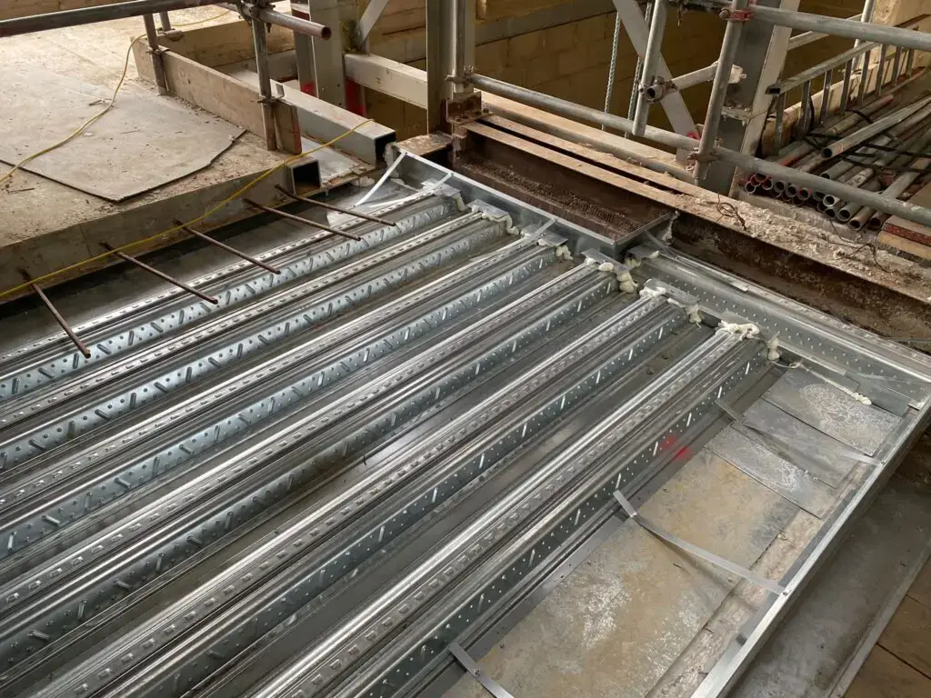 installing edge trims on metal roof decking