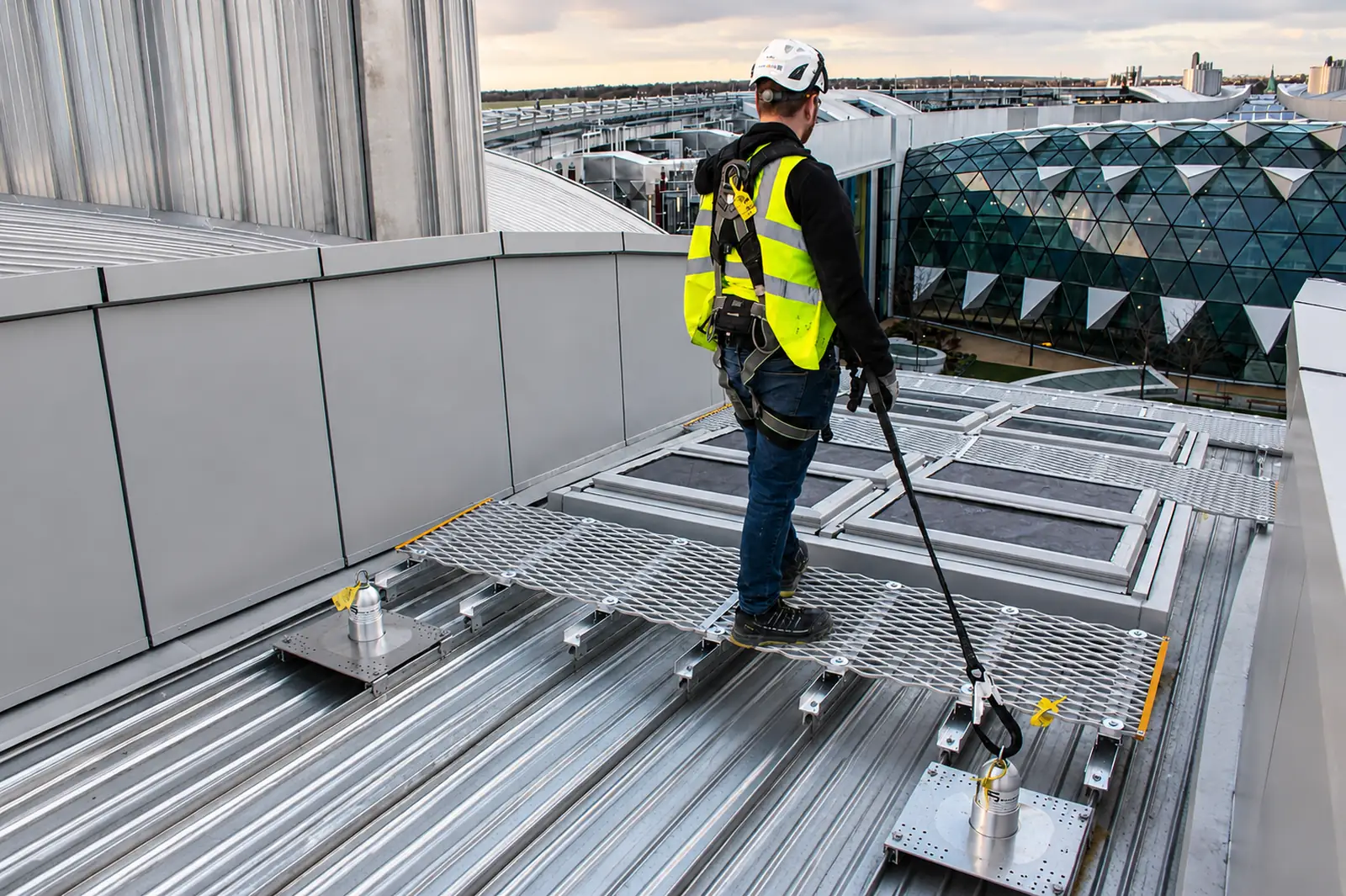 Fall arrest safety system for metal decking installation